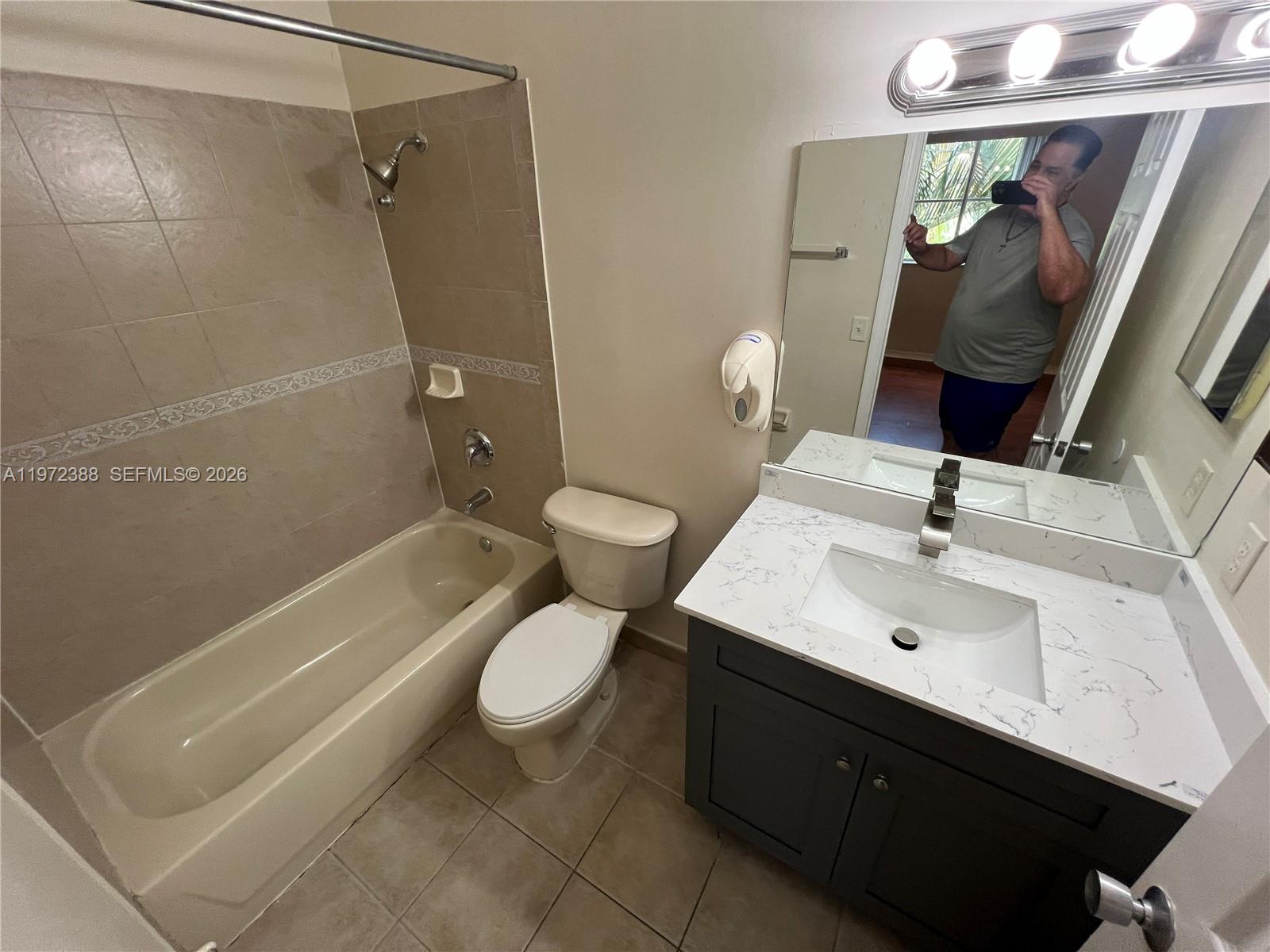 100 Southwest 15th Avenue Homestead, FL 33030 - Photo 40 of 62 a bathroom with a sink toilet and shower