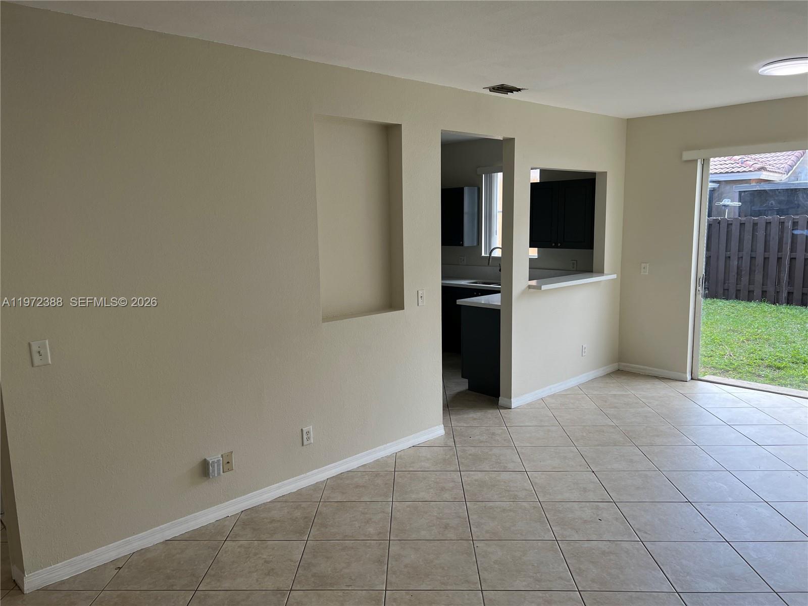 100 Southwest 15th Avenue Homestead, FL 33030 - Photo 5 of 62 a view of a kitchen with a sink
