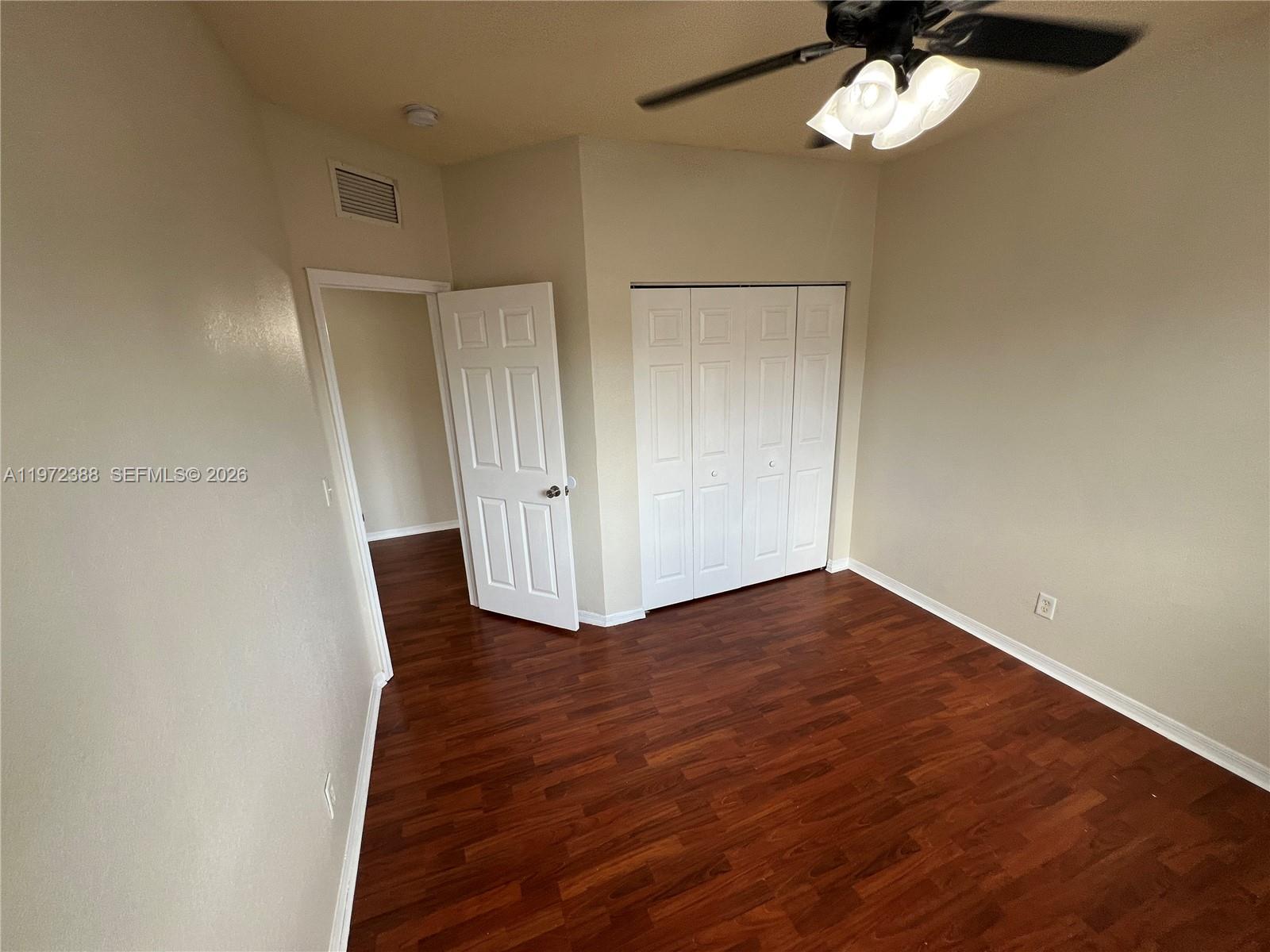 100 Southwest 15th Avenue Homestead, FL 33030 - Photo 53 of 62 a view of empty room with wooden floor