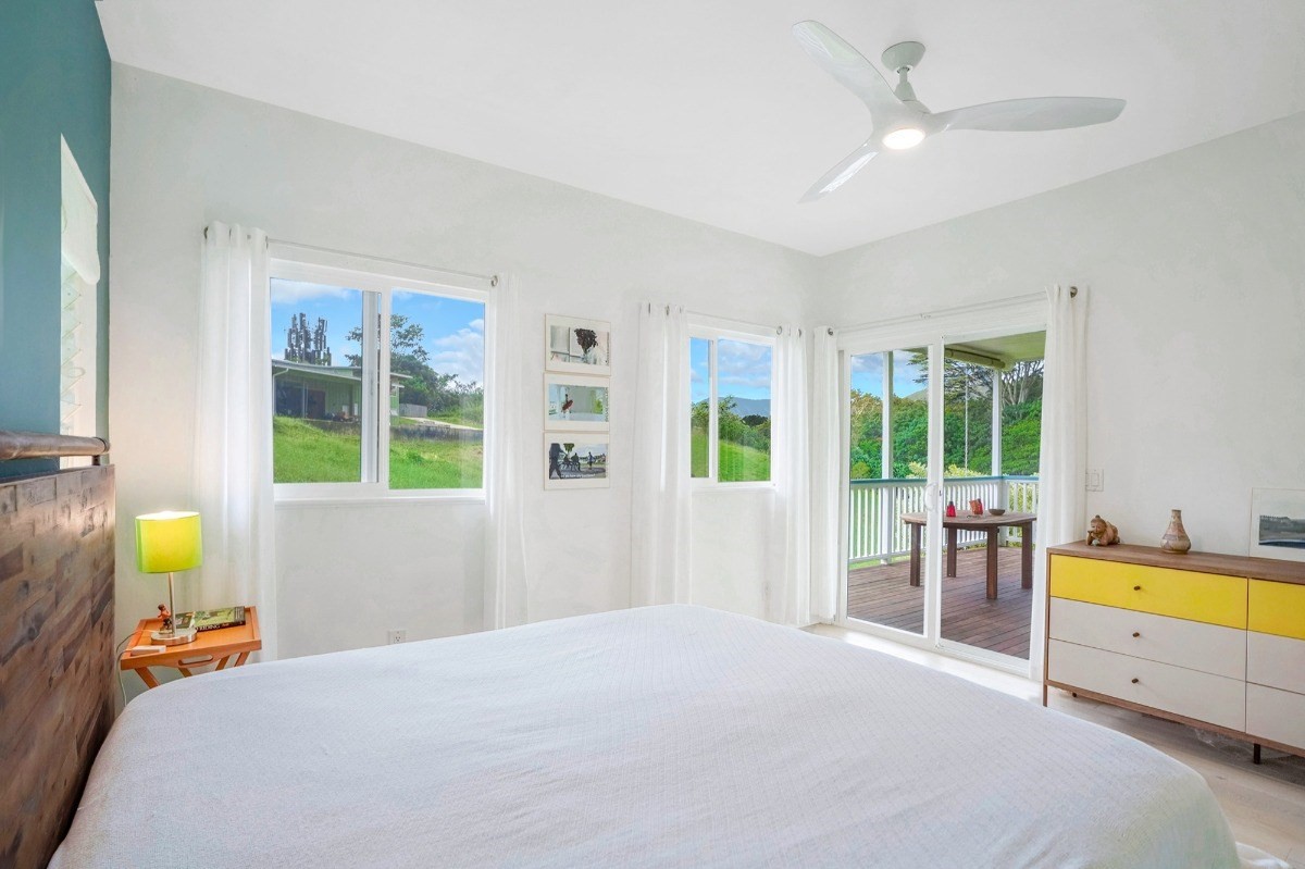 6431 Poo Road, Unit 2 Kapaa, HI 96746 - Photo 11 of 30 a bedroom with a bed and a window