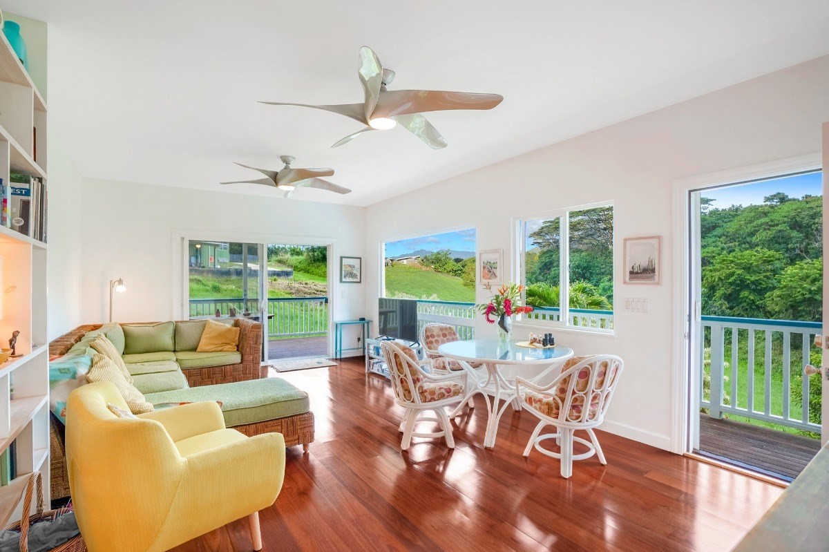 6431 Poo Road, Unit 2 Kapaa, HI 96746 - Photo 5 of 30 a living room with furniture and a large window