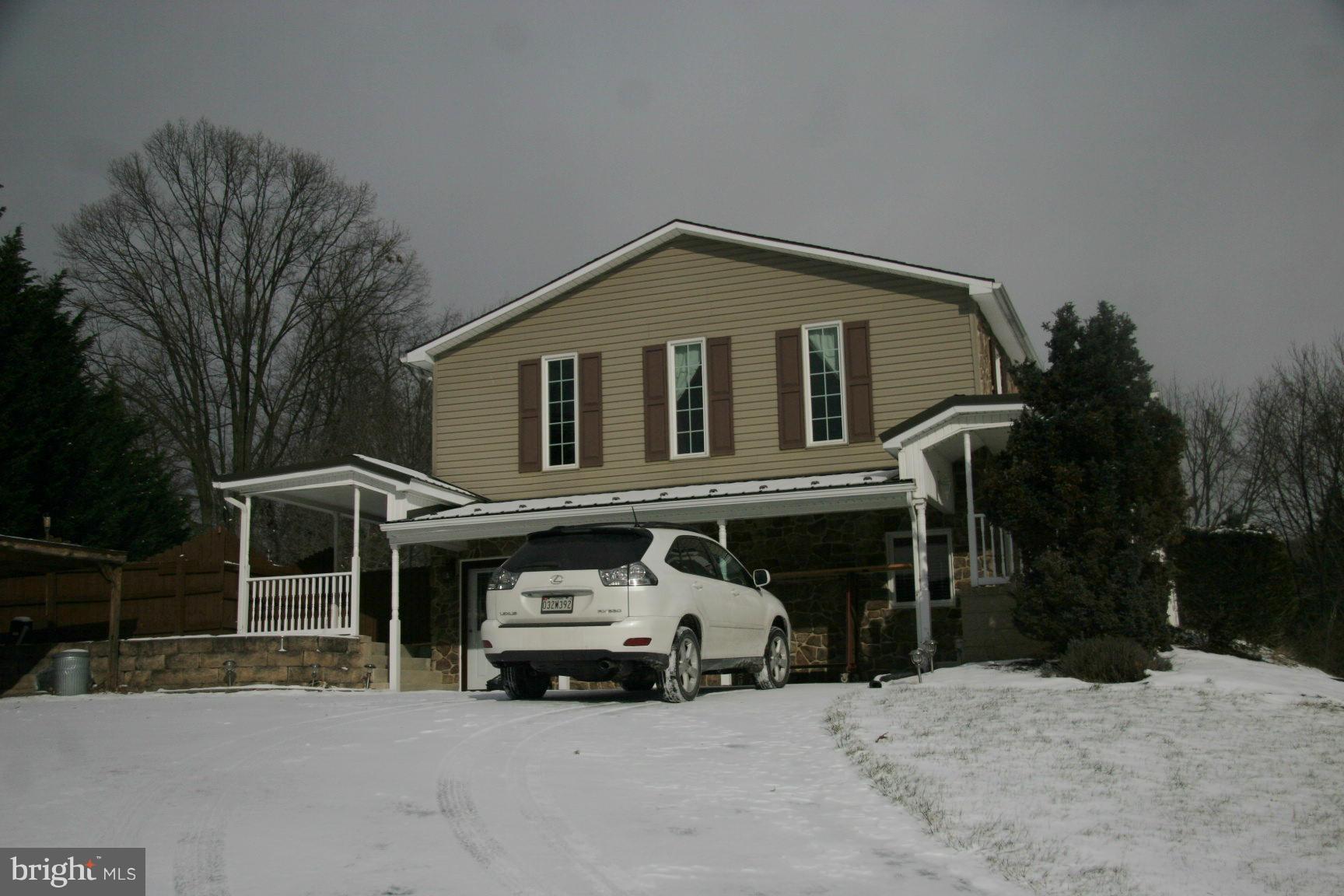 13102 Draper Road Clear Spring, MD 21722 - Photo 4 of 26 a car parked in front of house
