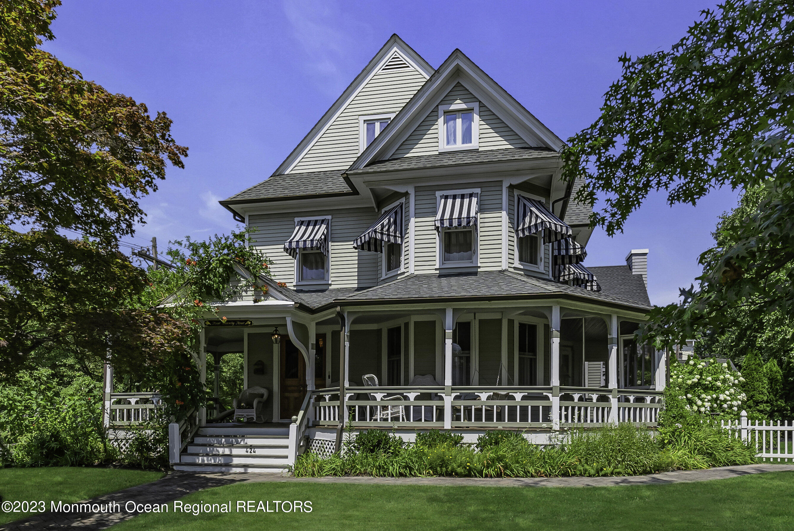 424 Mercer Avenue Spring Lake, NJ 07762 - Photo 1 of 36 a front view of a house with garden