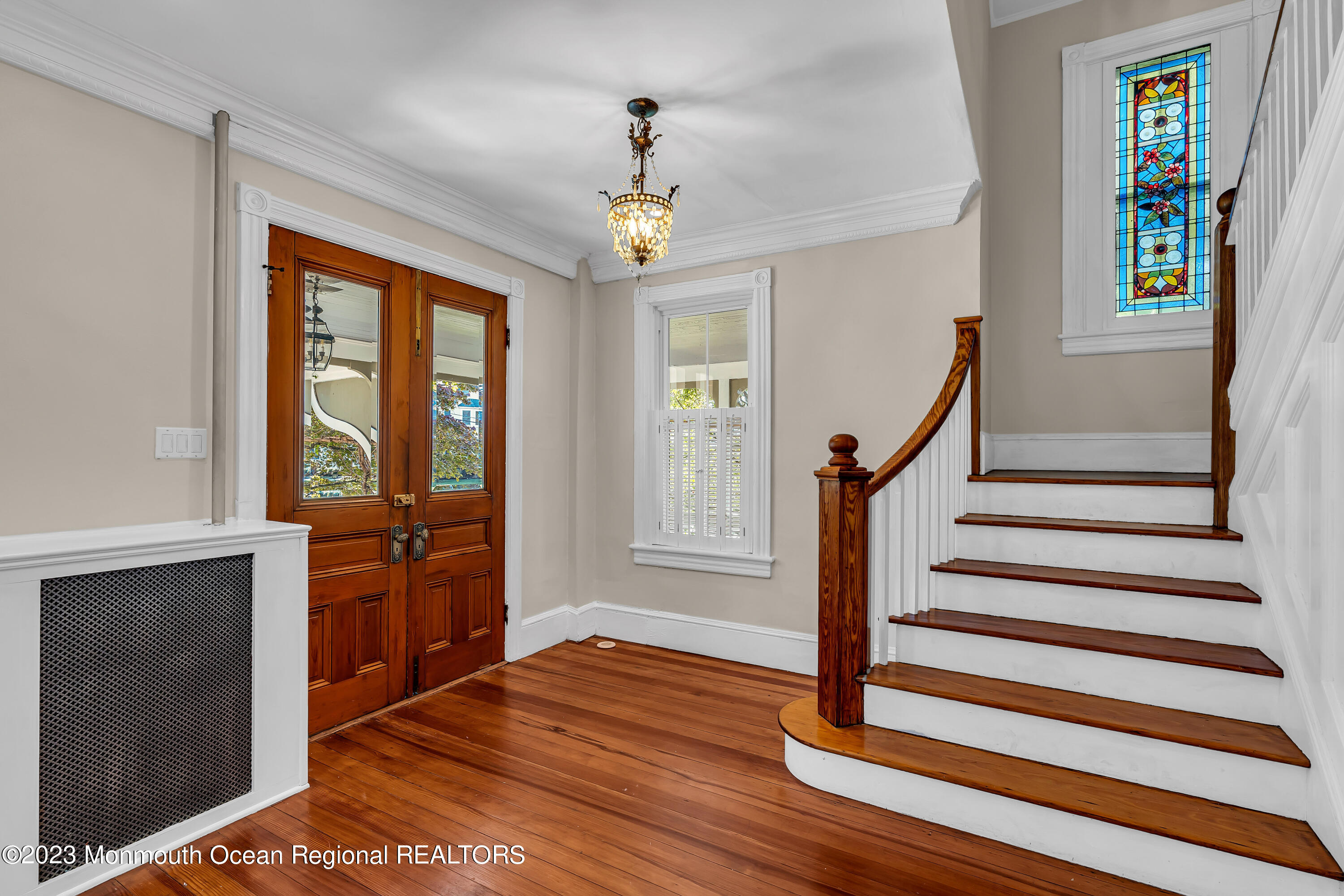 424 Mercer Avenue Spring Lake, NJ 07762 - Photo 11 of 36 a view of an entryway with wooden floor and door