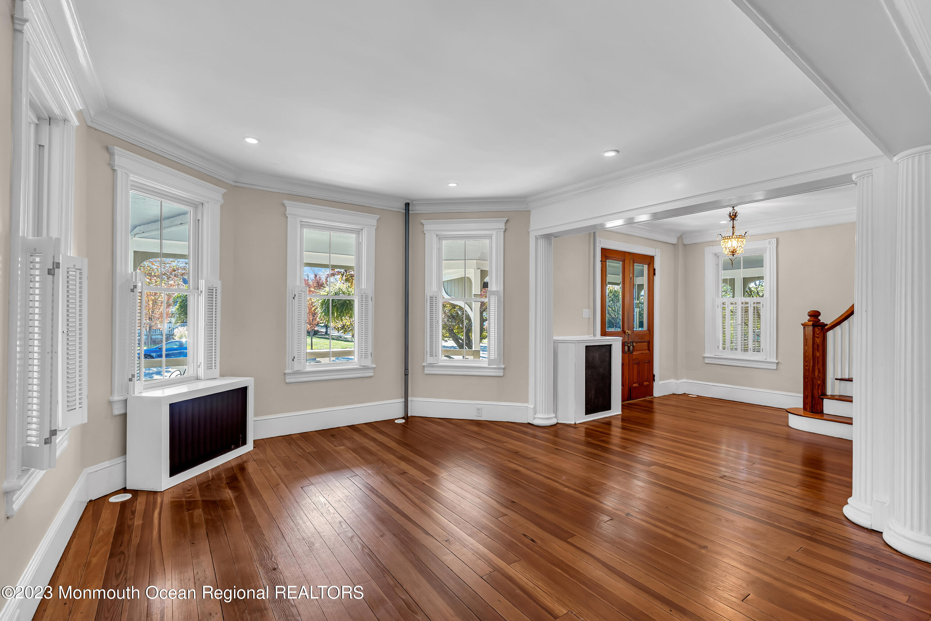 424 Mercer Avenue Spring Lake, NJ 07762 - Photo 14 of 36 a view of empty room with wooden floor and fan