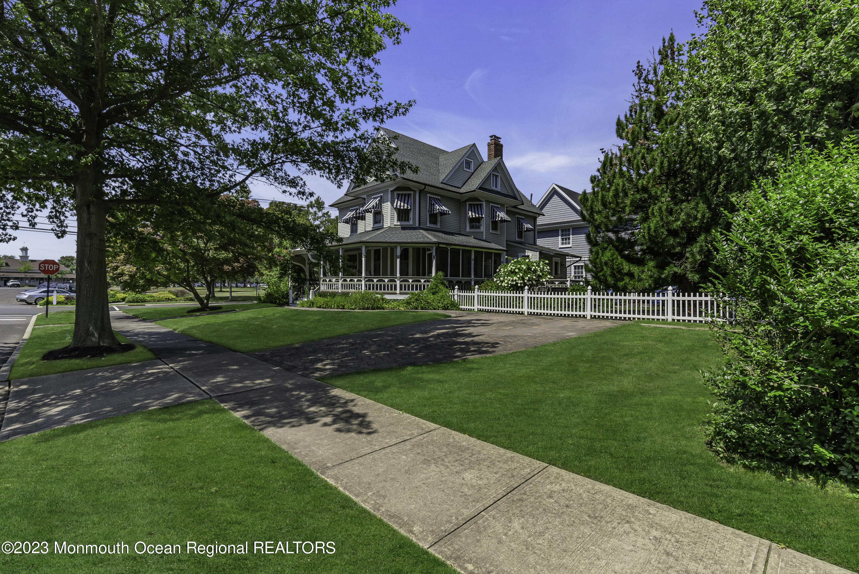 424 Mercer Avenue Spring Lake, NJ 07762 - Photo 2 of 36 a front view of a house with a yard
