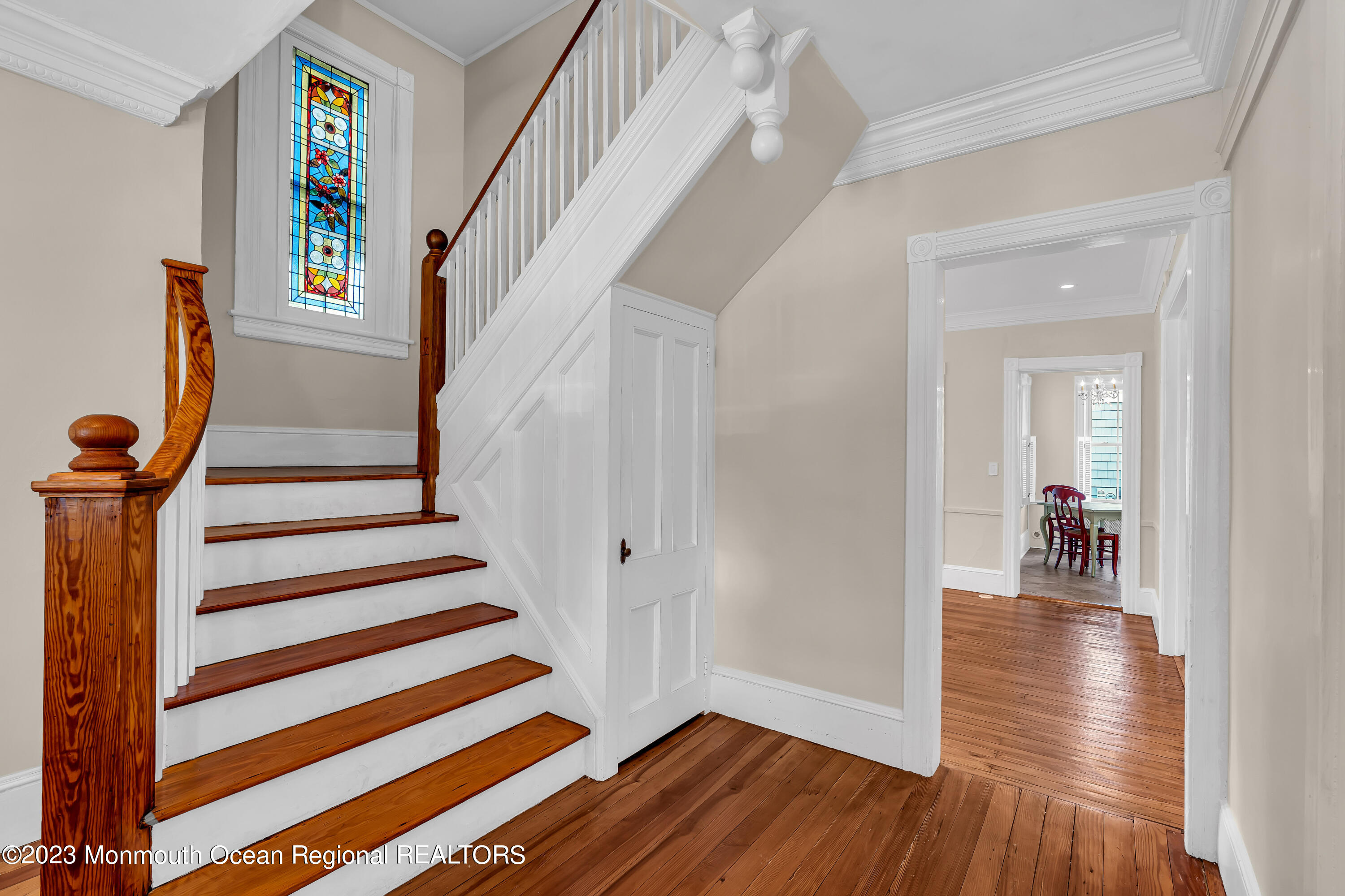 424 Mercer Avenue Spring Lake, NJ 07762 - Photo 21 of 36 a view of entryway with wooden floor and stairs