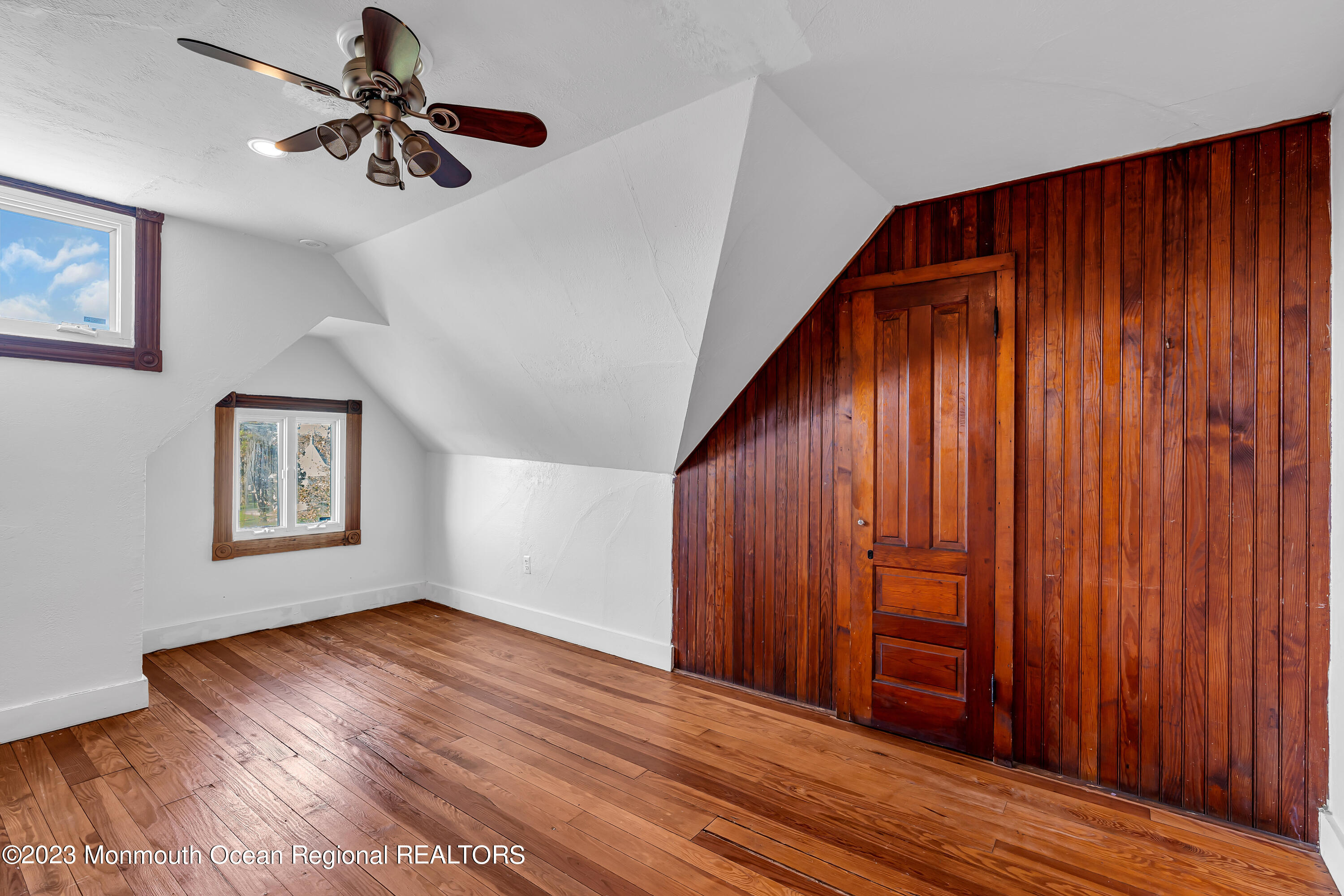 424 Mercer Avenue Spring Lake, NJ 07762 - Photo 28 of 36 a view of an empty room with wooden floor