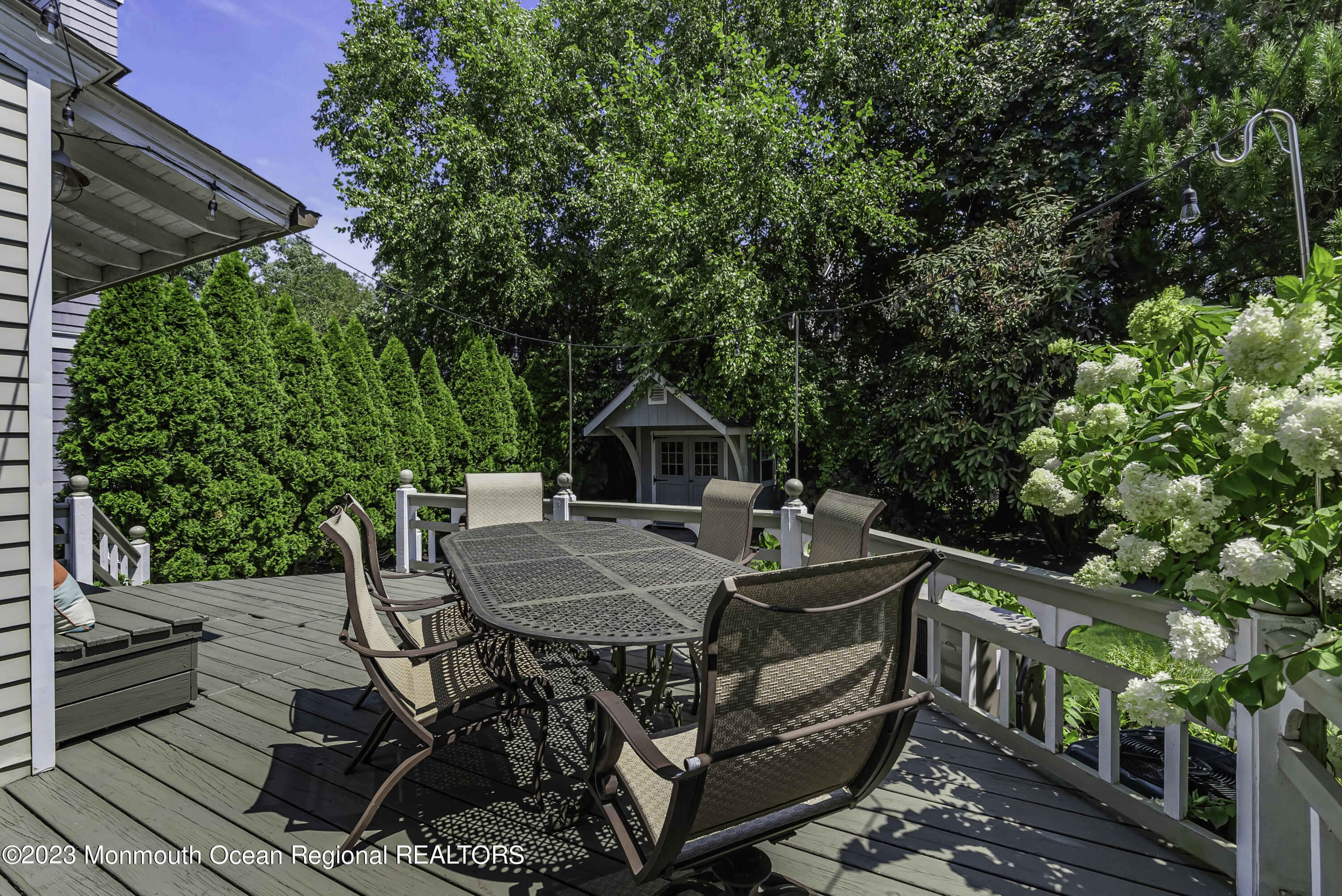 424 Mercer Avenue Spring Lake, NJ 07762 - Photo 33 of 36 a view of a dinning table and chairs in patio