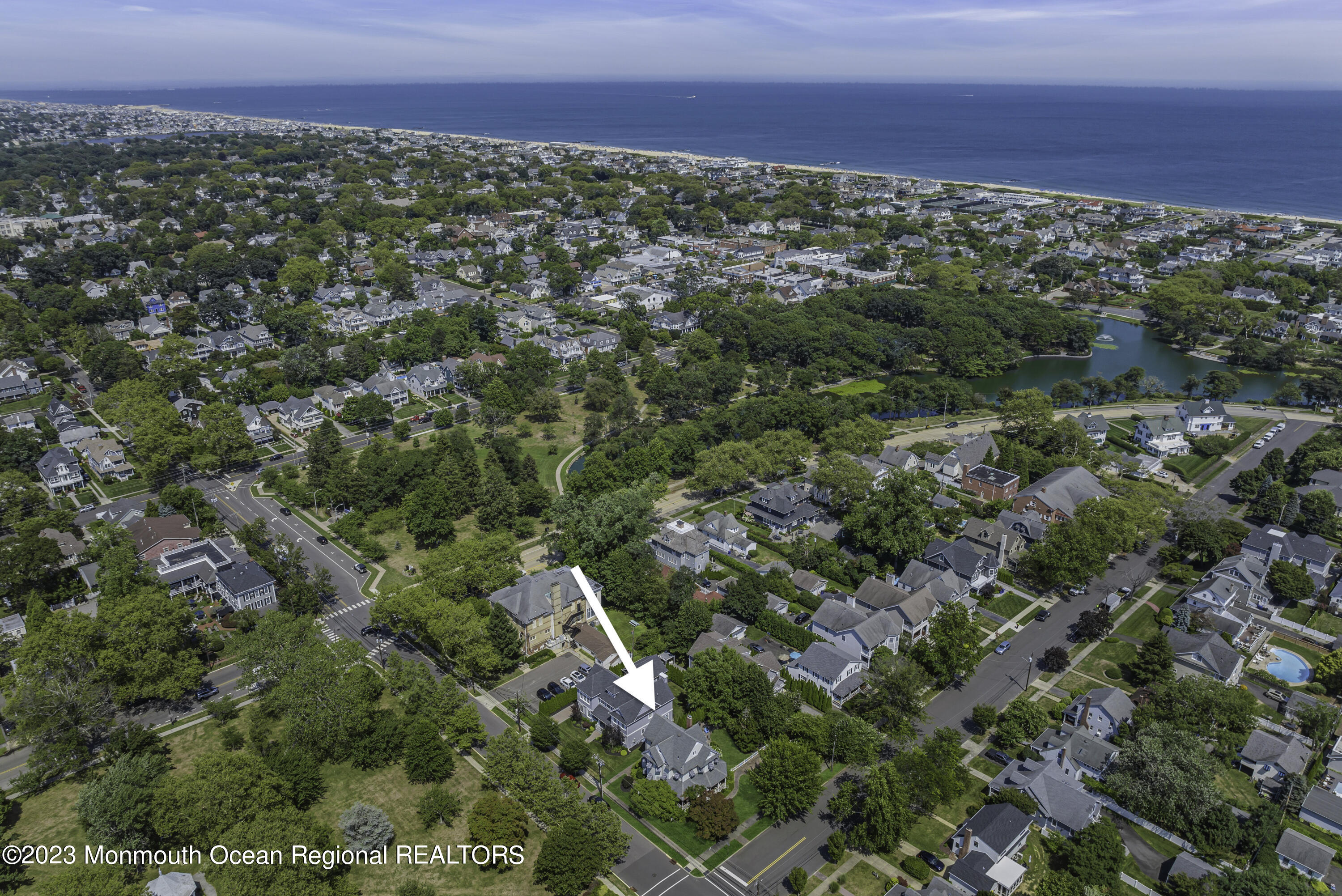424 Mercer Avenue Spring Lake, NJ 07762 - Photo 4 of 36 an aerial view of residential houses with outdoor space and trees