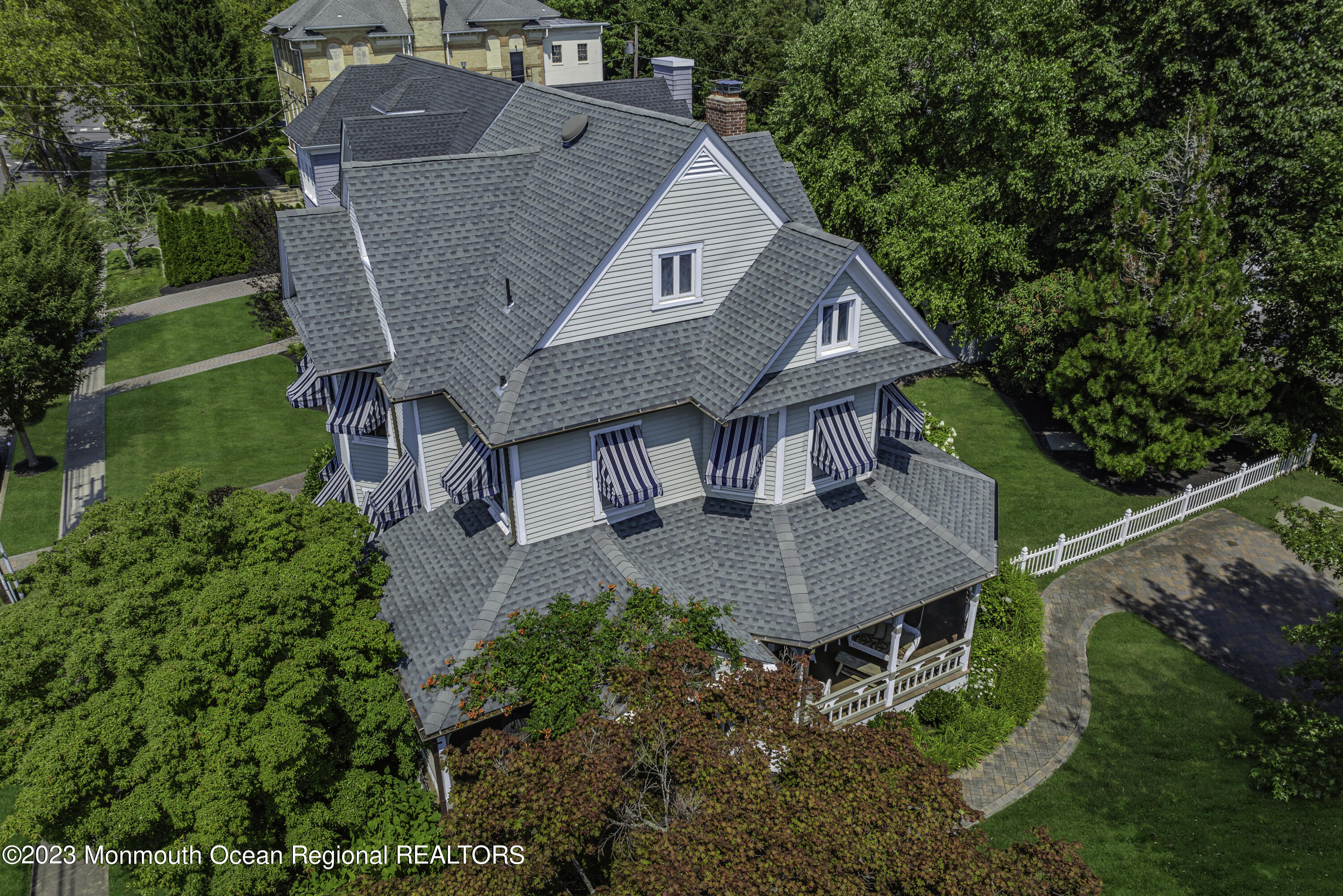 424 Mercer Avenue Spring Lake, NJ 07762 - Photo 5 of 36 a aerial view of a house with a yard deck and a garden