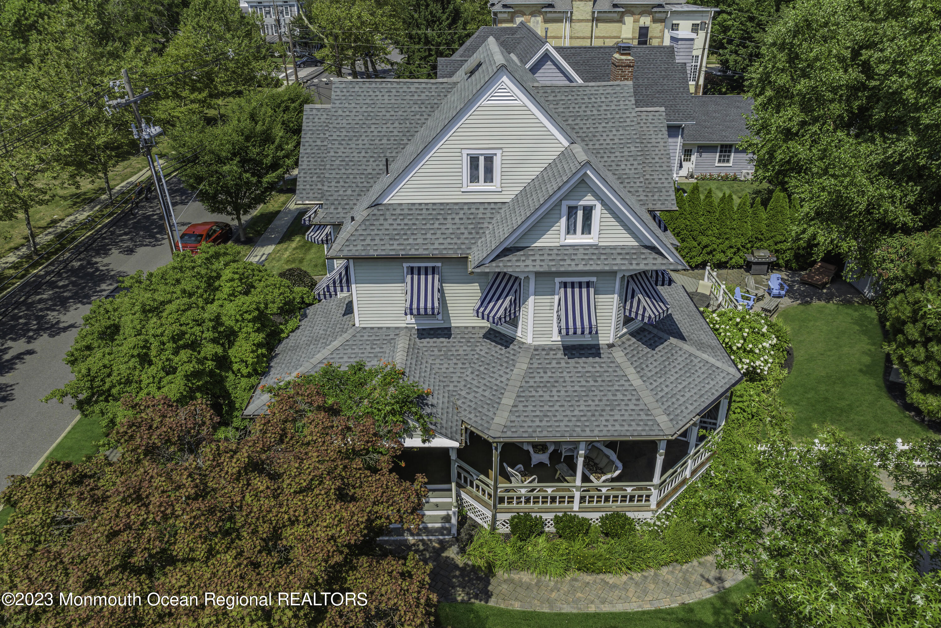 424 Mercer Avenue Spring Lake, NJ 07762 - Photo 6 of 36 a aerial view of a house with table and trees
