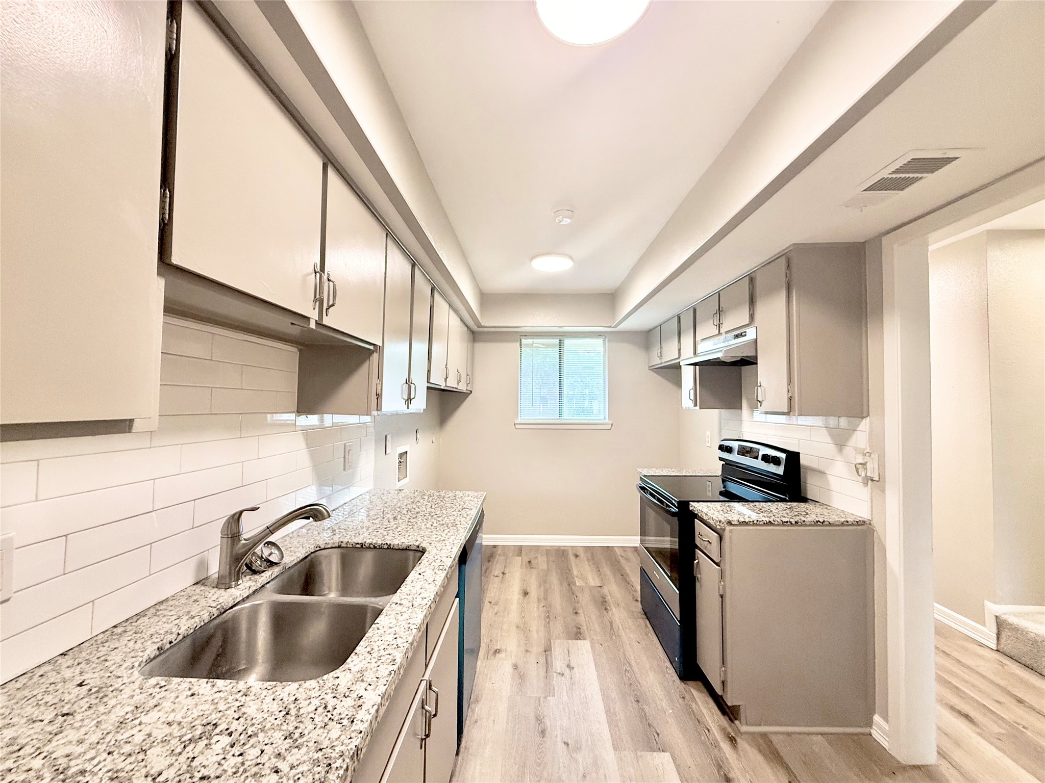 7980 Grove Ridge Drive Houston, TX 77061 - Photo 5 of 19 Fully functional Kitchen with NEW stove and dishwasher