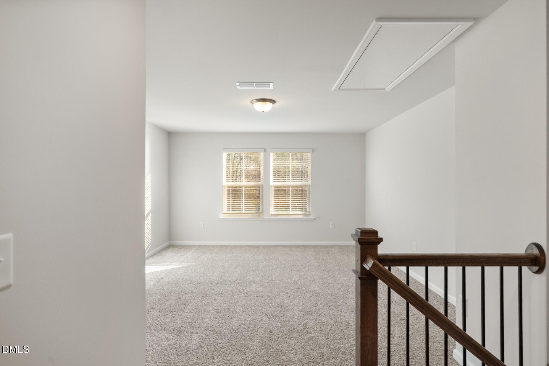 232 Bridle Brk Way Fuquay-Varina, NC 27526 - Photo 12 of 28 a view of an empty room with a window