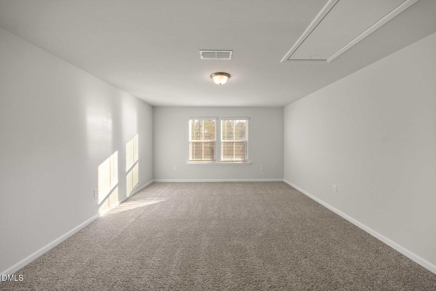 232 Bridle Brk Way Fuquay-Varina, NC 27526 - Photo 14 of 28 an empty room with windows