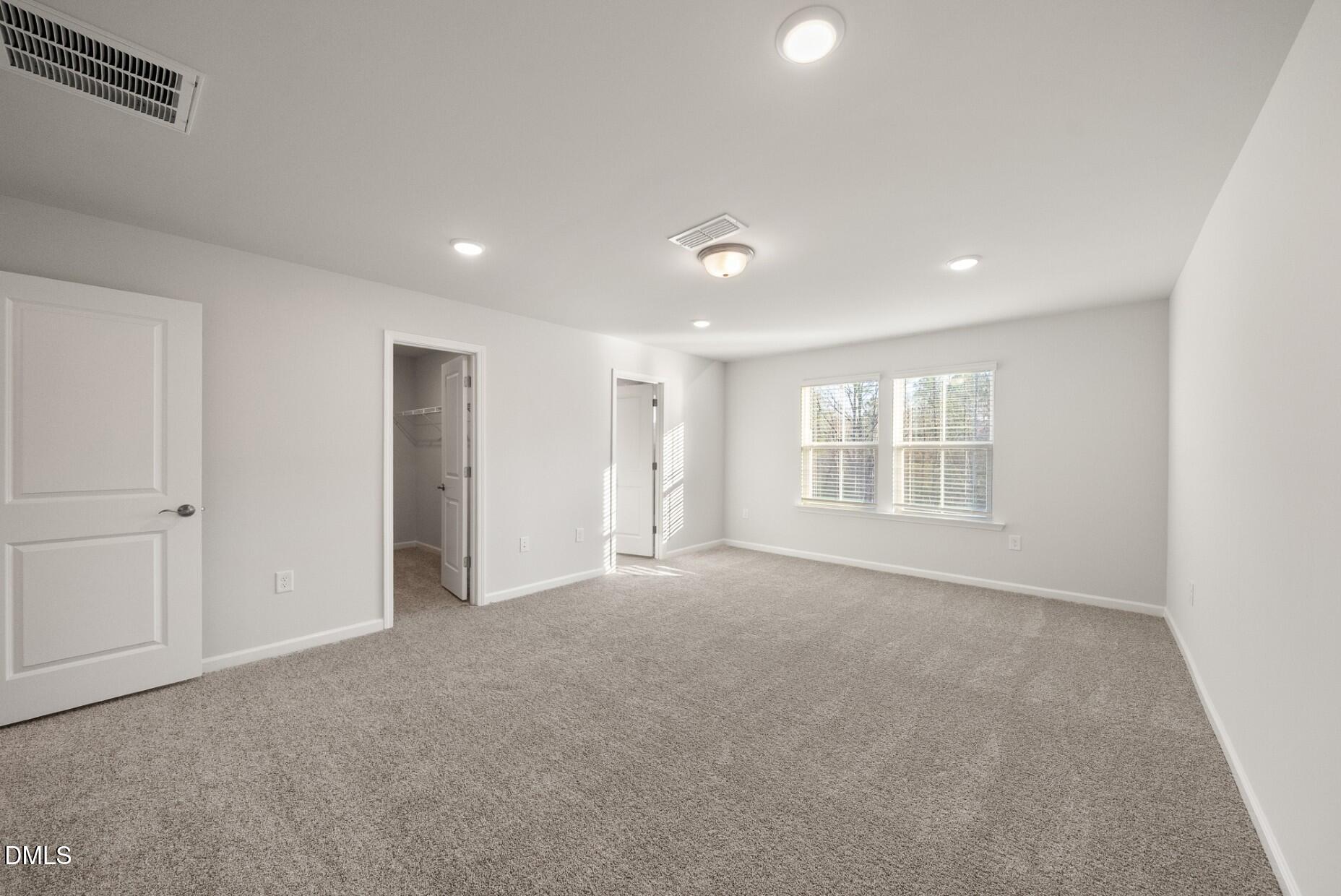 232 Bridle Brk Way Fuquay-Varina, NC 27526 - Photo 15 of 28 a view of an empty room with a window