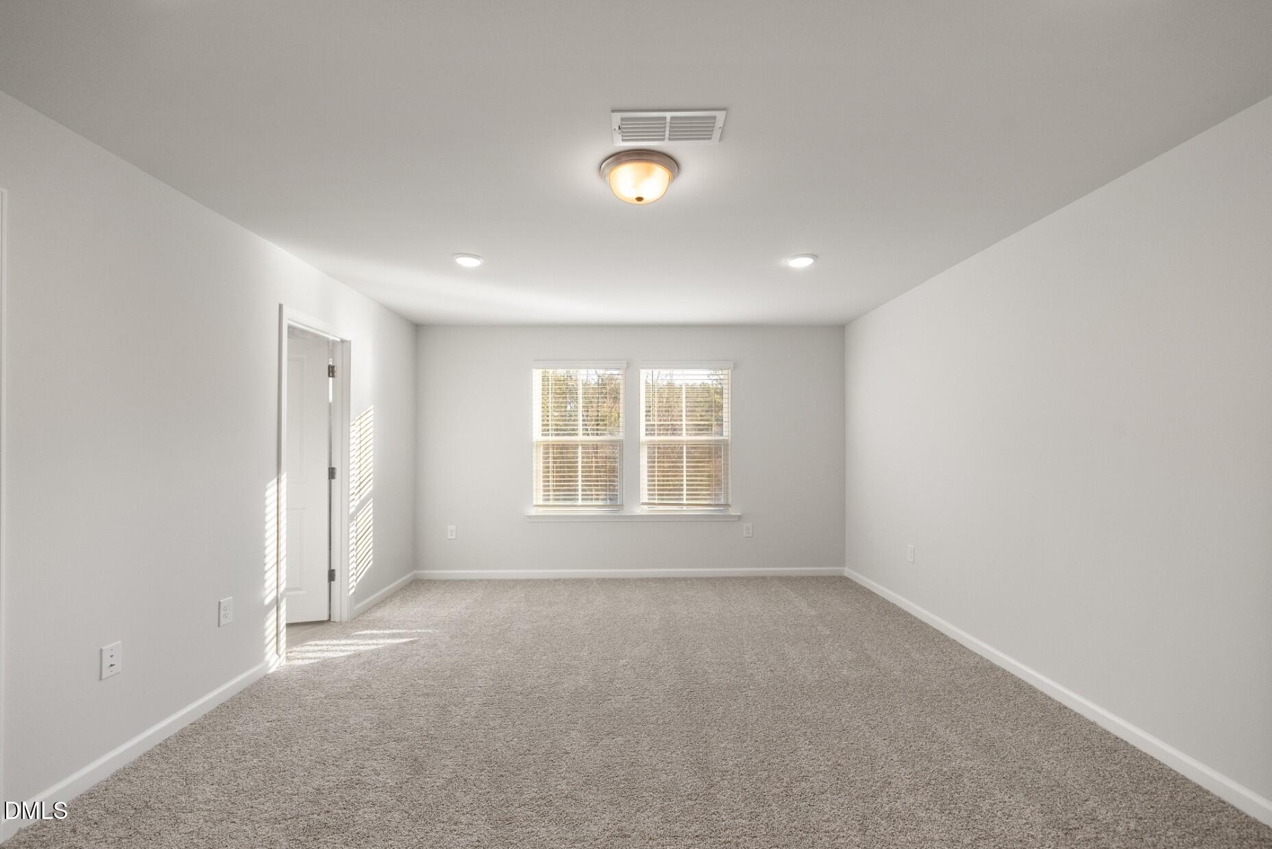 232 Bridle Brk Way Fuquay-Varina, NC 27526 - Photo 17 of 28 an empty room with a window