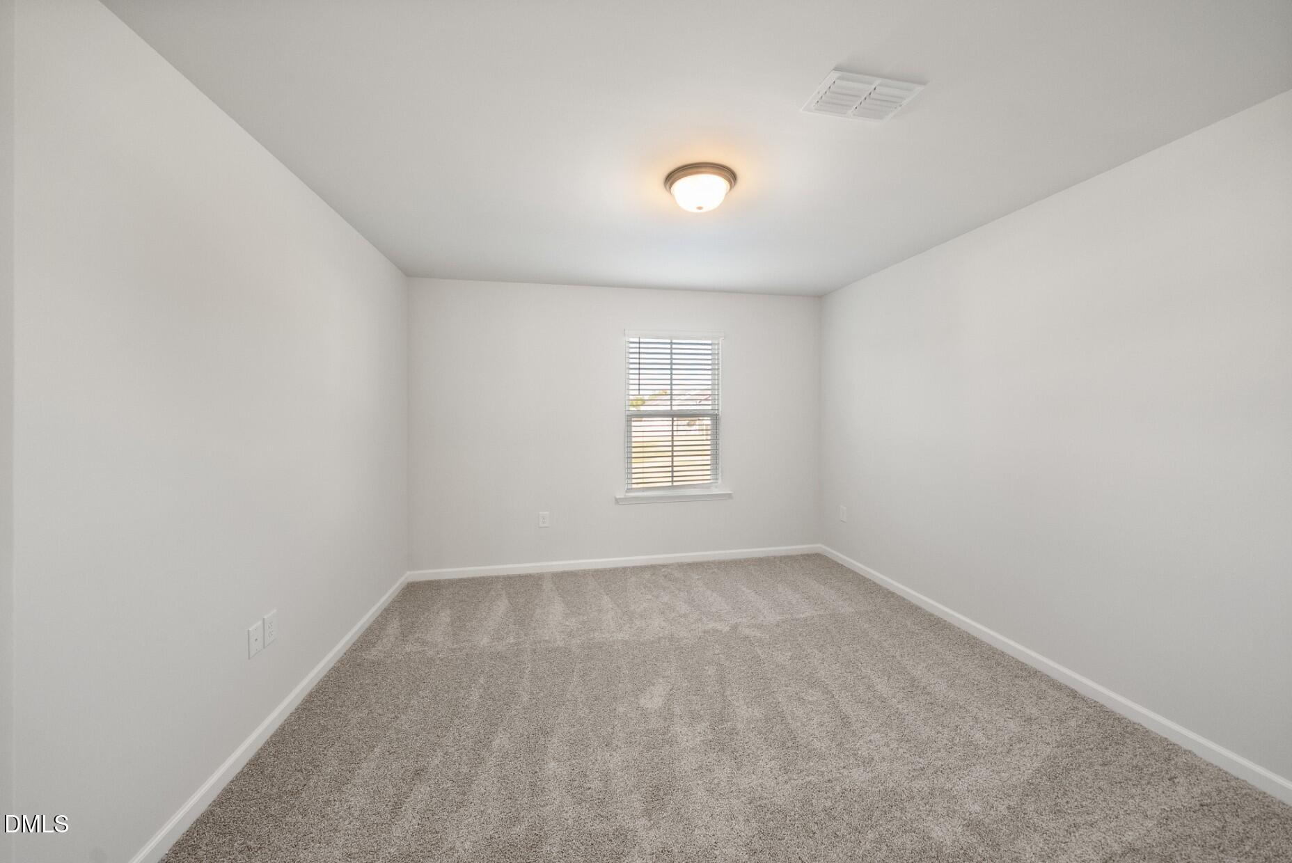 232 Bridle Brk Way Fuquay-Varina, NC 27526 - Photo 23 of 28 an empty room with a window