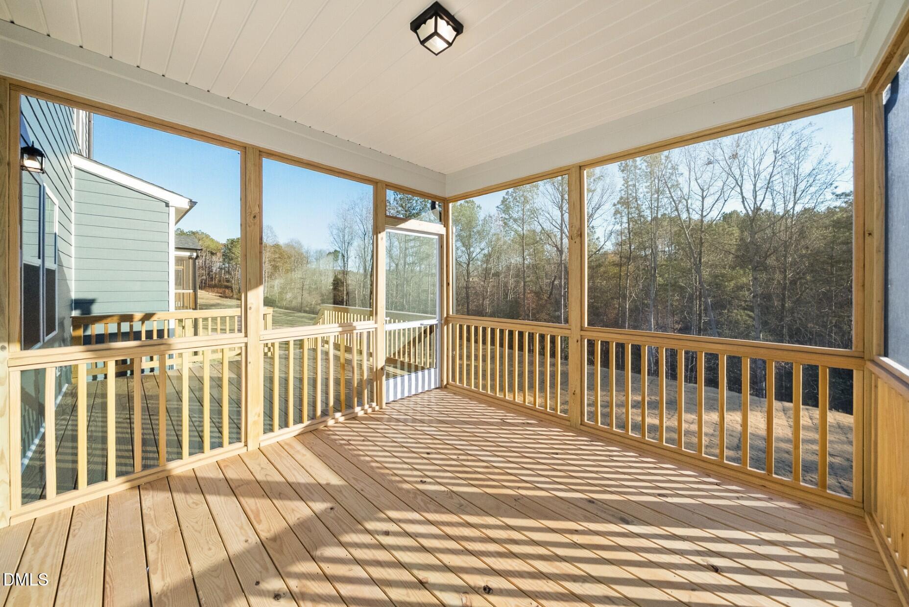 232 Bridle Brk Way Fuquay-Varina, NC 27526 - Photo 25 of 28 a view of a balcony with wooden floor