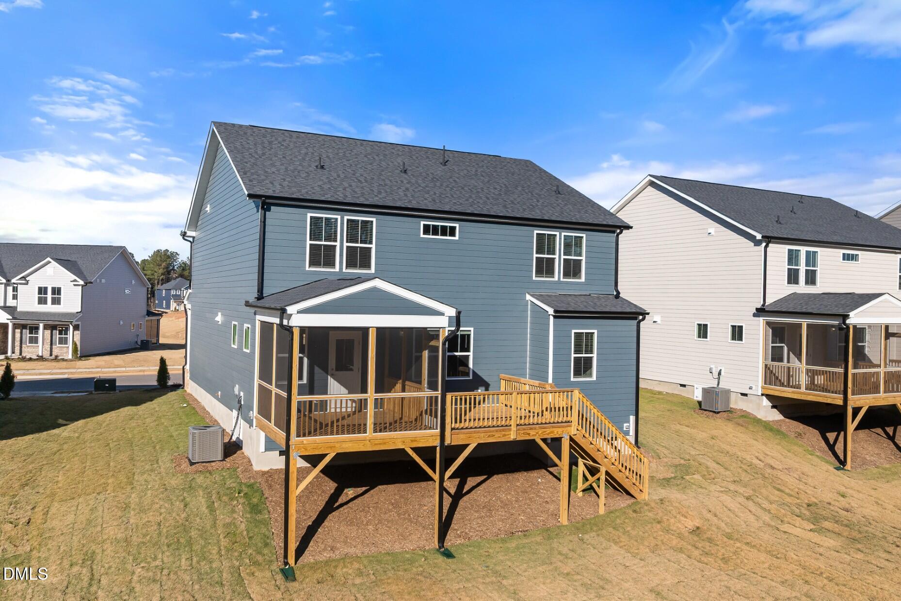 232 Bridle Brk Way Fuquay-Varina, NC 27526 - Photo 27 of 28 a view of a house with backyard and porch