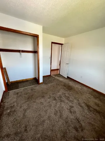 an empty room with closet