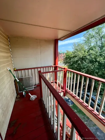 a view of staircase with large window