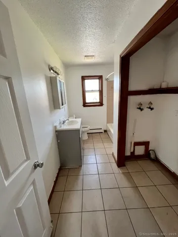 a view of a utility room with windows