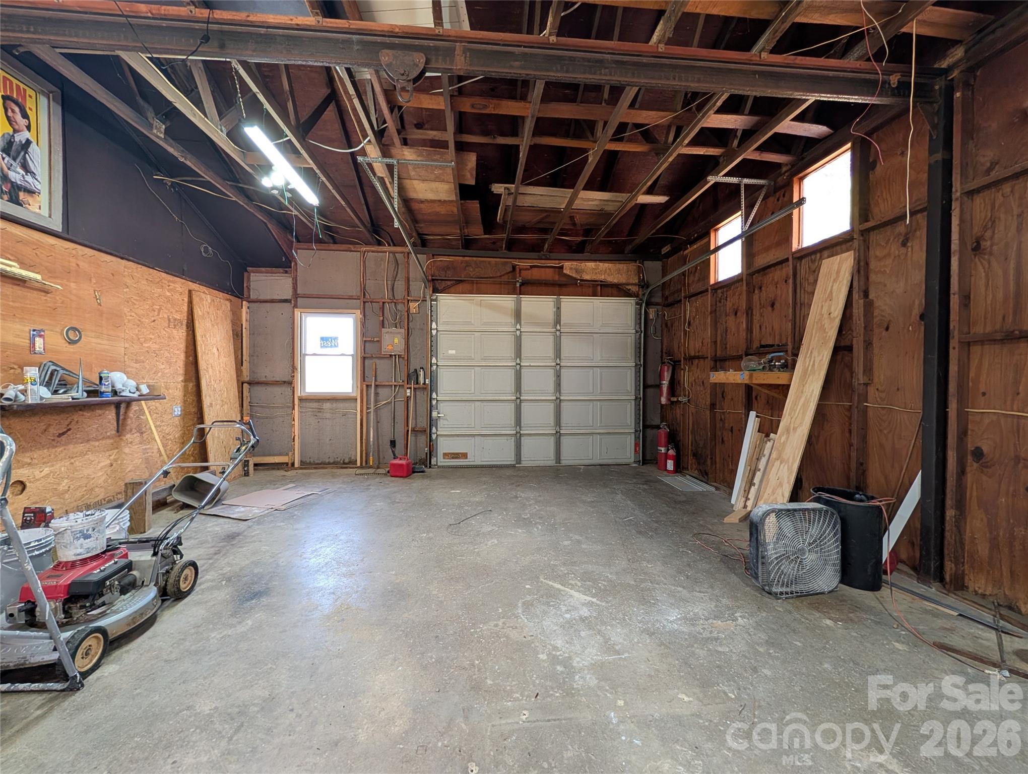 945 Summers Road Valdese, NC 28690 - Photo 23 of 25 a view of a garage with red carpet