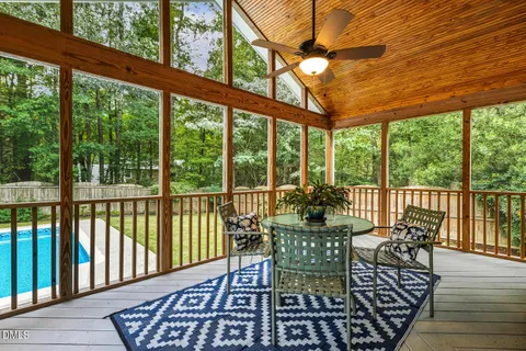 a view of a balcony with furniture