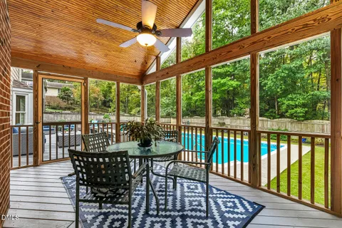 a view of a balcony with furniture