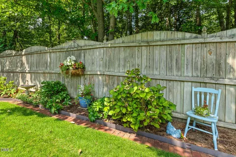 a garden view with a seating space