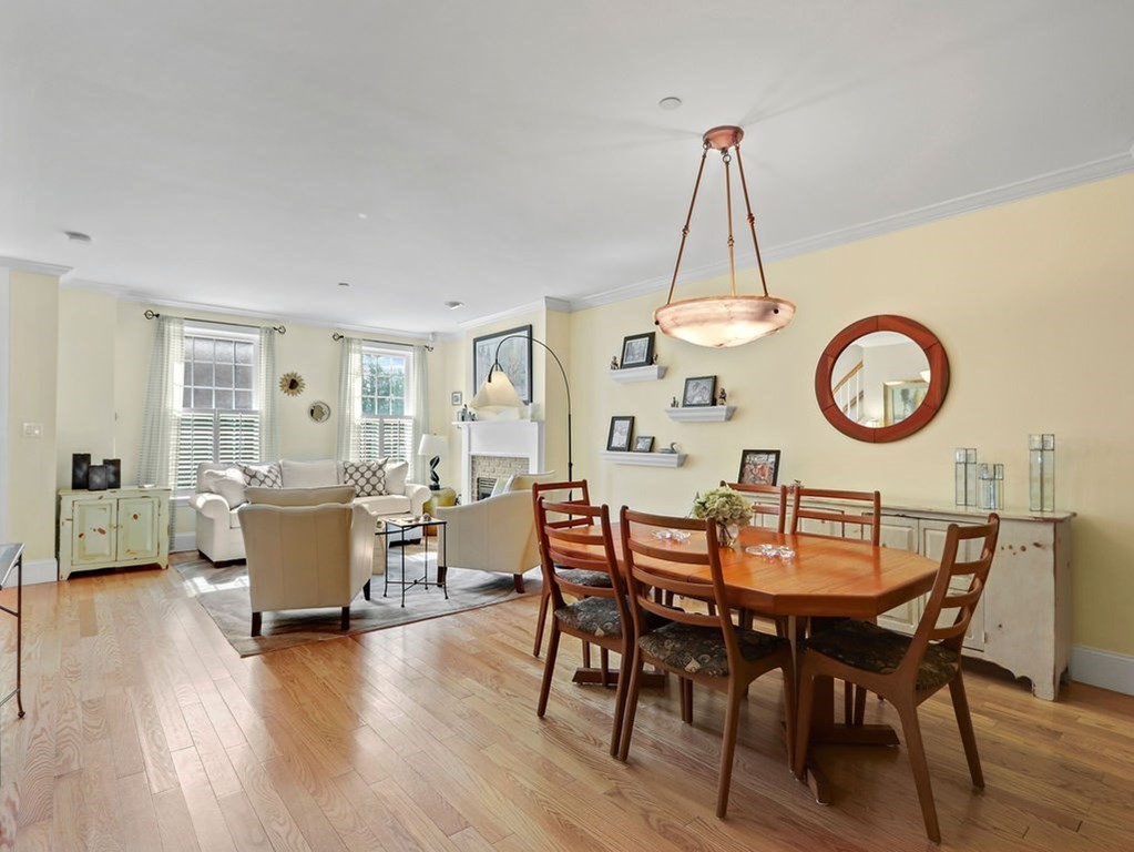 64 Constitution Road, Unit 64 Boston, MA 02129 - Photo 2 of 18 a view of a dining room with furniture and a large window