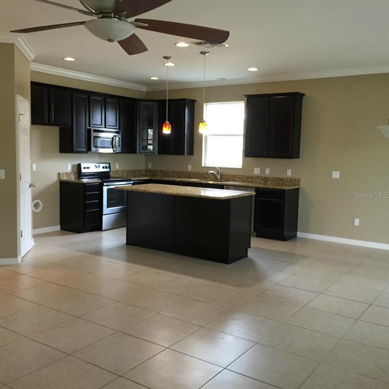3503 Rhapsody Street St. Cloud, FL 34772 - Photo 1 of 1 View of Kitchen from Living Room