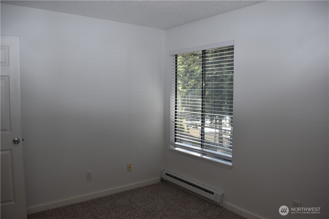 33035 18th Place South Federal Way, WA 98003 - Photo 12 of 21 a view of an empty room with a window