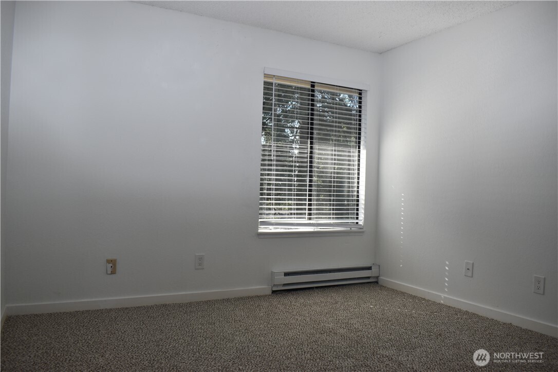 33035 18th Place South Federal Way, WA 98003 - Photo 13 of 21 a view of an empty room with a window