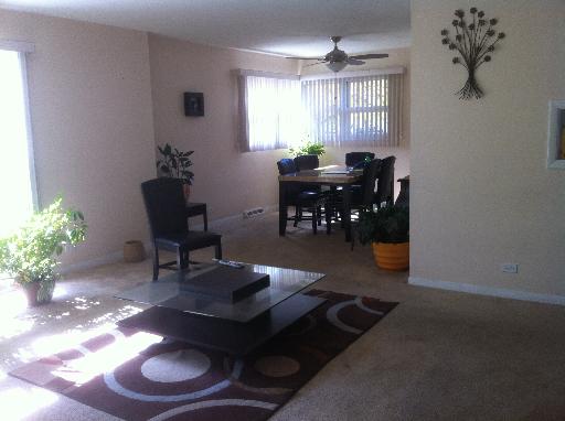 1450 Birch Road Homewood, IL 60430 - Photo 2 of 11 a workspace with furniture a chandelier and window
