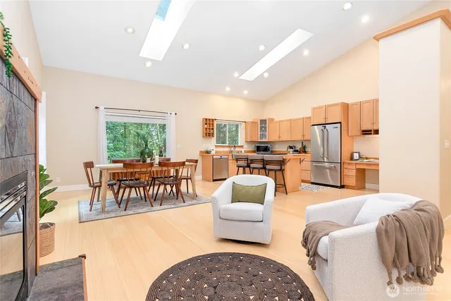 a living room with furniture and a table