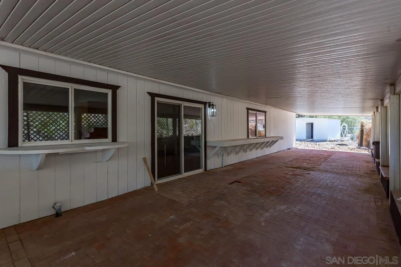 11834 Rocoso Road Lakeside, CA 92040 - Photo 17 of 28 a view of empty room with large windows