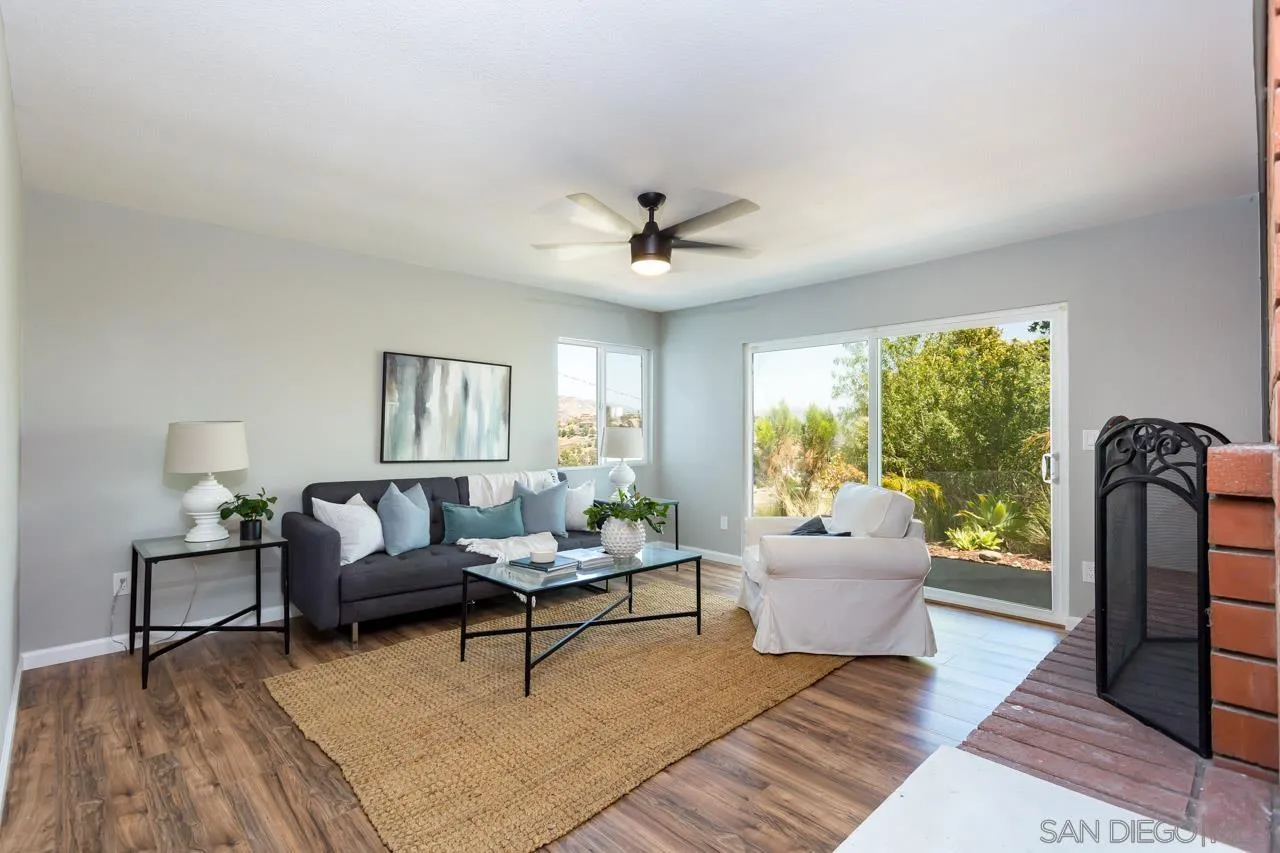 11834 Rocoso Road Lakeside, CA 92040 - Photo 4 of 28 a living room with furniture and a large window
