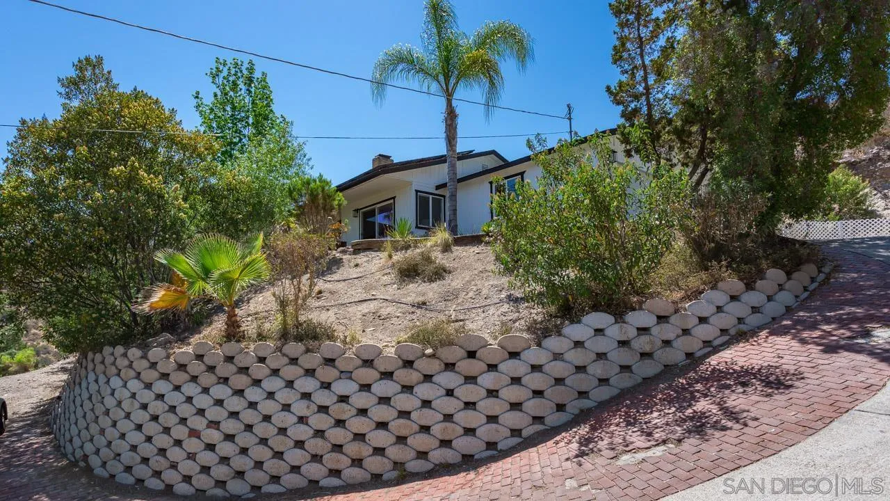 11834 Rocoso Road Lakeside, CA 92040 - Photo 7 of 28 a house view with a backyard space