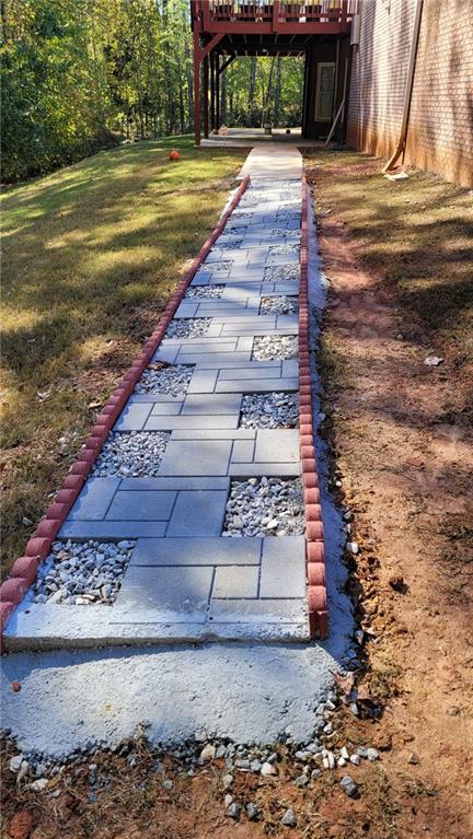 2750 Wellington Way Southeast Conyers, GA 30013 - Photo 8 of 10 a view of a yard with plants