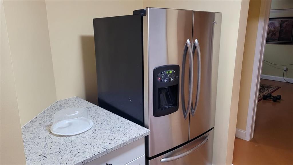 2750 Wellington Way Southeast Conyers, GA 30013 - Photo 9 of 10 a bathroom with a granite countertop sink and a mirror