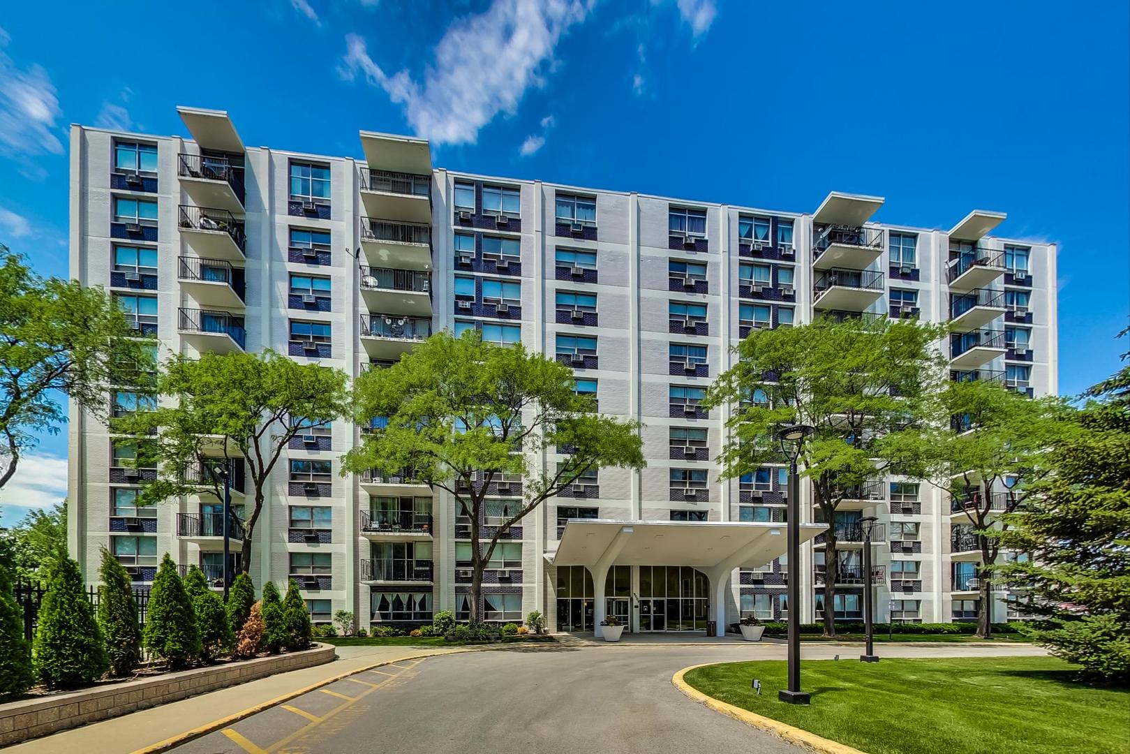9009 Golf Road, Unit 8B Des Plaines, IL 60016 - Photo 4 of 42 a front view of a building with garden