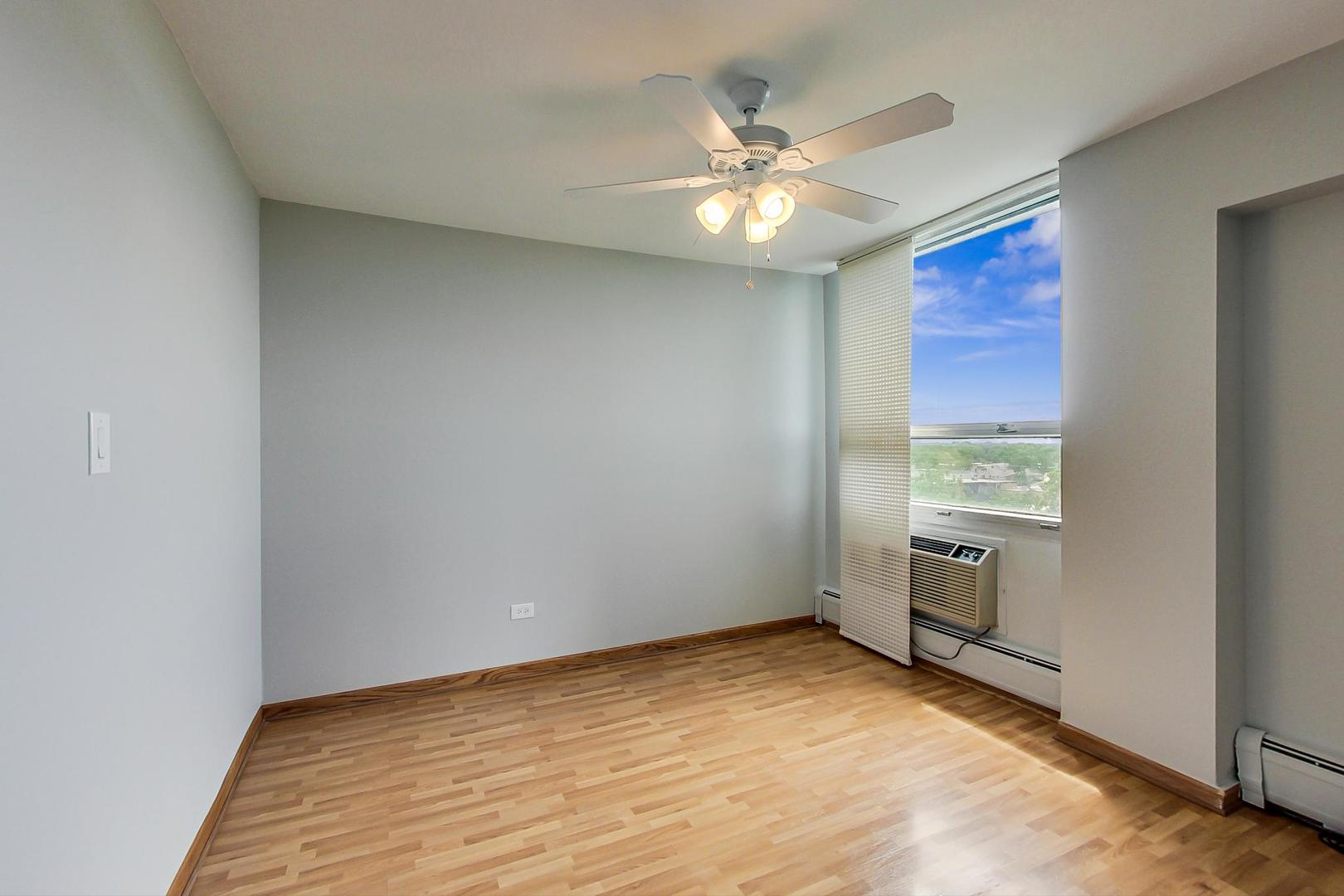 9009 Golf Road, Unit 8B Des Plaines, IL 60016 - Photo 33 of 42 a view of an empty room with a window