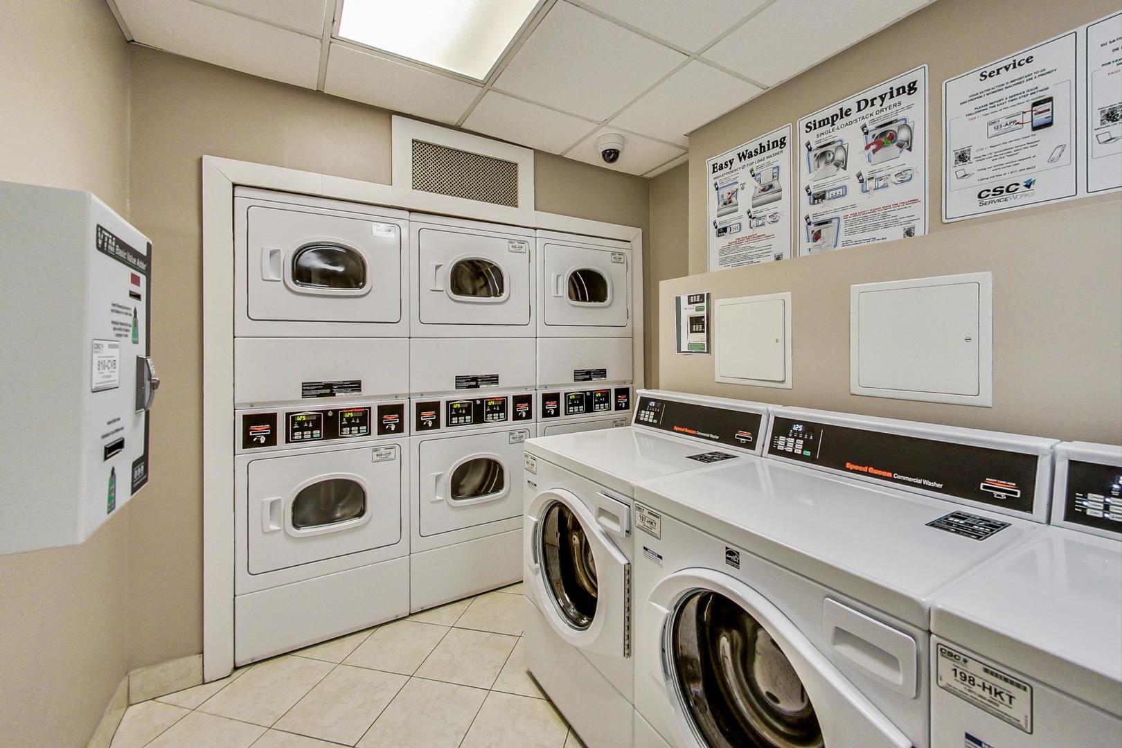 9009 Golf Road, Unit 8B Des Plaines, IL 60016 - Photo 36 of 42 a utility room with dryer and washer