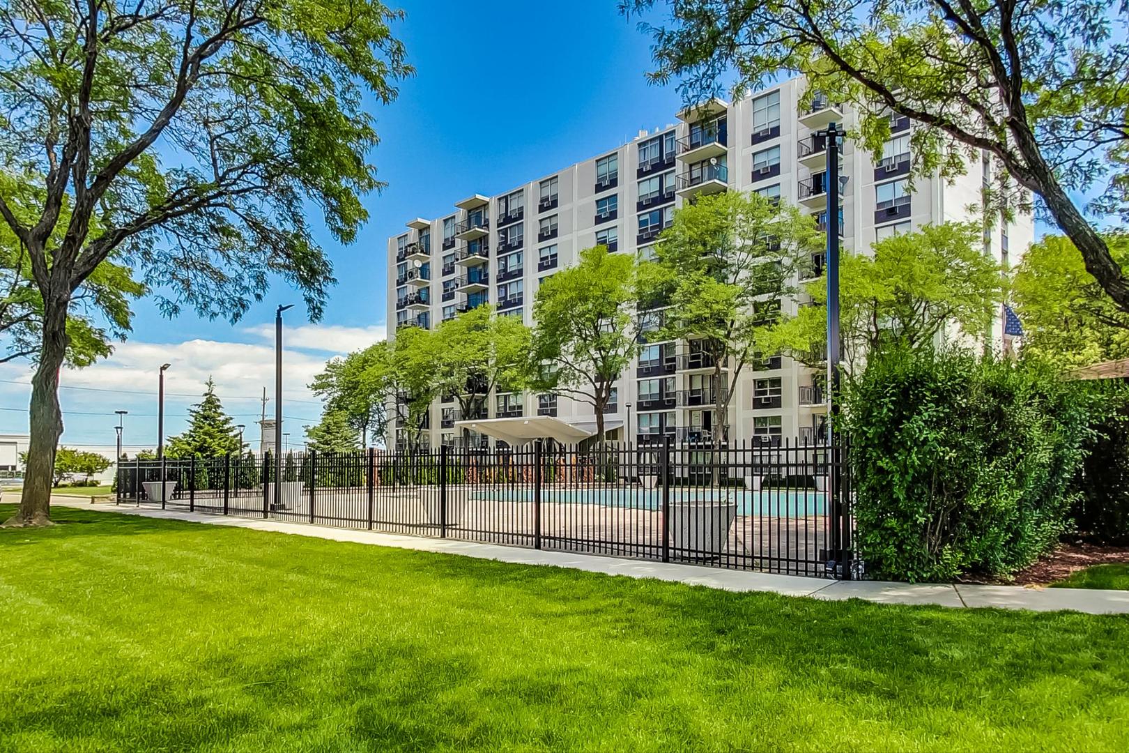 9009 Golf Road, Unit 8B Des Plaines, IL 60016 - Photo 40 of 42 a view of a building with a garden