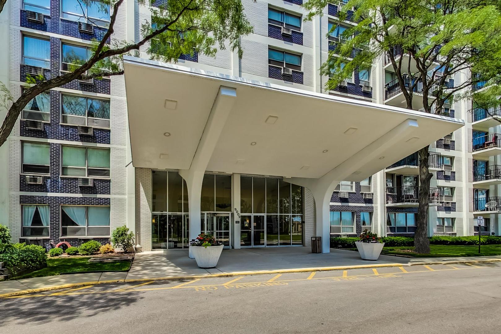 9009 Golf Road, Unit 8B Des Plaines, IL 60016 - Photo 5 of 42 a front view of a building with street view
