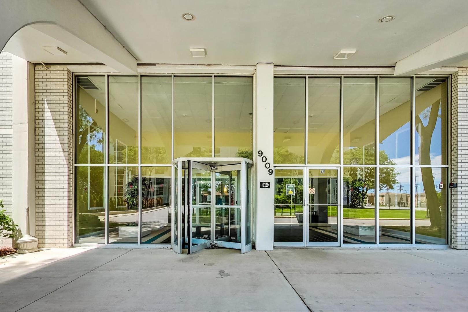 9009 Golf Road, Unit 8B Des Plaines, IL 60016 - Photo 6 of 42 a view of a building with door