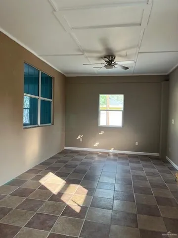 a view of an empty room and window