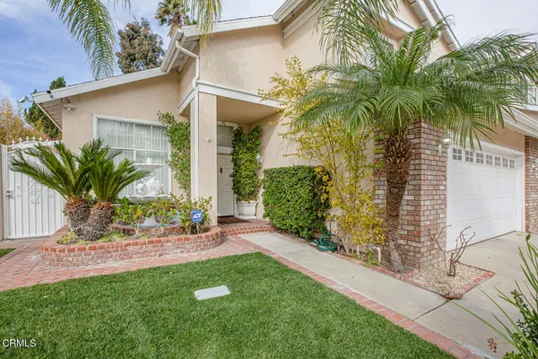 a view of a yard with a patio